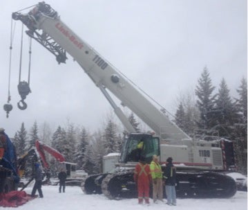 all west crane in the snow